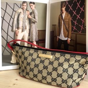 Gucci gg supreme clutch/bag